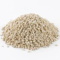 Close-up of an Aluminium Silicate 120 mesh abrasive media mound on a white studio background