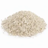 Mound of Aluminium Silicate 16 mesh angular abrasive grains on white background