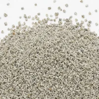 Close-up of Aluminium Silicate 180 mesh angular abrasive grit mound on white background