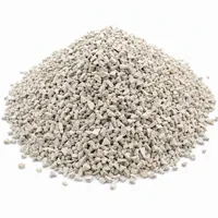 Mound of off-white angular Aluminium Silicate 200 mesh abrasive powder on white background