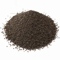 Mound of coarse brown aluminum oxide grit on white background