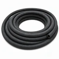 13 mm ID 10 meter black rubber blast hose coiled on white background
