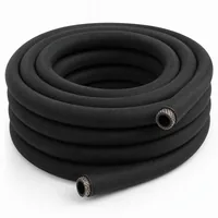 Coiled 13 mm ID black rubber blast hose, 15 meter length, on white background