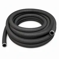Coiled 16 mm ID 25 m black rubber blast hose on white background