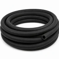 Coiled 19 mm ID industrial blast hose 10 meters long on white background