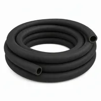 50 mm ID blast hose coiled on white background
