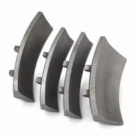 Set of four high chrome blast wheel blades on white background