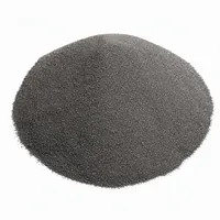 Tungsten carbide-cobalt thermal spray coating powder in a neat mound on a white studio background