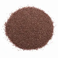 Mound of reddish-brown Garnet Sand 20 mesh abrasive on white background