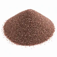 Mound of Garnet Sand 30 mesh abrasive media on white background