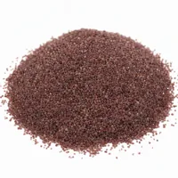 Close-up of reddish-brown Garnet Sand 80 Mesh abrasive granules in a mound