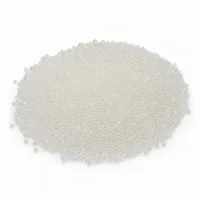 Mound of 30/60 mesh glass bead abrasive blasting media on white background