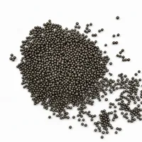 Mild Steel Shot S660 spherical metallic abrasive media in a mound on white background