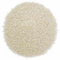 Mound of Urea Plastic Abrasive 30/60 mesh grit on white background