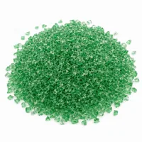 Mound of Urea Plastic Abrasive 40/60 mesh green angular grit on white background