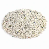Mound of Urea Plastic Abrasive 40 mesh grit on white background