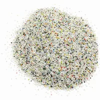 Mound of Plastic Abrasive 70 mesh urea media on white background