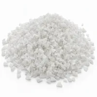 Mound of Plastic Abrasive 80 mesh angular particles on white background