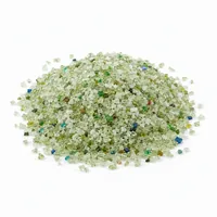 Mound of Plastic Media Type II 54 mesh angular abrasive particles on white background