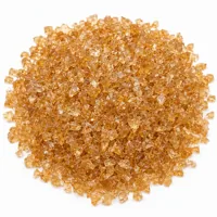 Close-up of angular Plastic Media Type II 90 mesh abrasive particles on white background