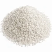 Mound of angular translucent off-white Type III melamine plastic blast media particles on white background