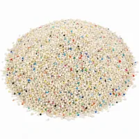 Mound of Plastic Media Type III 240 mesh angular melamine abrasive particles on white background