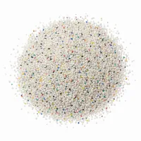 Mound of Type III 40 mesh angular plastic blasting media on white background