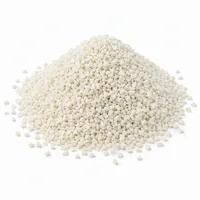 Off-white angular Plastic Media Type III 60/80 mesh abrasive granules in a mound on a white background