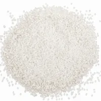 Close-up of angular Type V acrylic plastic blasting media 150 mesh on white background
