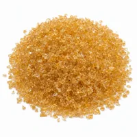Plastic Media Type V 24 mesh angular acrylic abrasive particles piled on white background