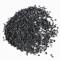 Silicon Carbide angular abrasive grit mound on white background