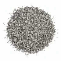 Stainless Steel Shot S280 spherical abrasive media pile on white background