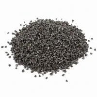 Steel Grit G18 angular metallic abrasive particles in a mound on white background