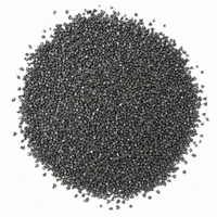 Close-up of angular Steel Grit G40 abrasive particles on white background