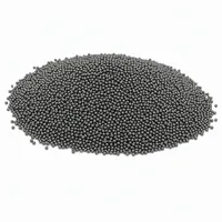 Steel Shot S230 spherical cast steel abrasive media mound on white background