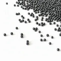 Steel Shot S390 spherical high-carbon steel abrasive media in a studio mound