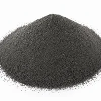 Dark grey metallic thermal spray coating powder sample on white background