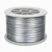 Precision-wound zinc wire coil on industrial spool for thermal spray coating
